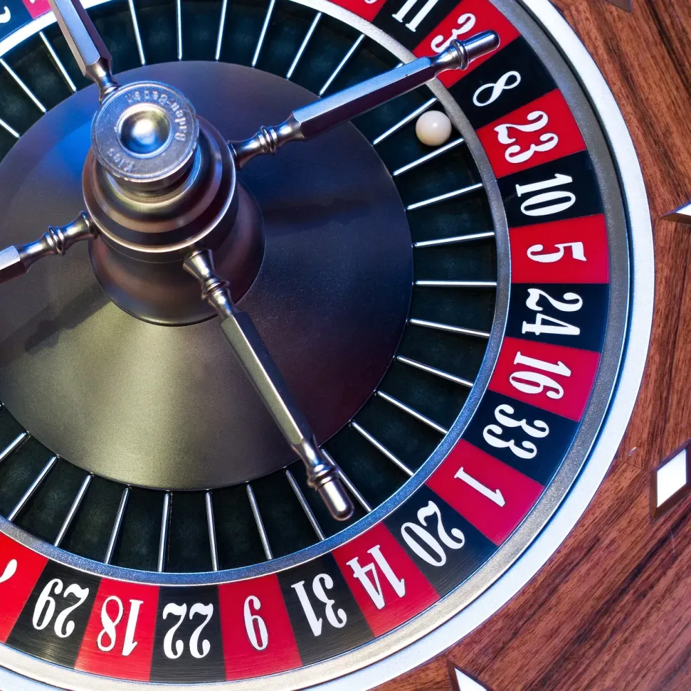 Top view of a roulette wheel with the ball in a numbered pocket
